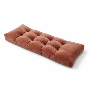 Custom tufted bench cushion in terracotta velvet fabric with button detailing